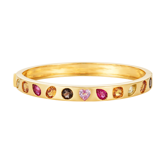 Catena Autumn Bangle in 18k yellow gold with orange sapphires, pink sapphires, yellow sapphires, green sapphires, and rhodolite, and smokey quartz. 